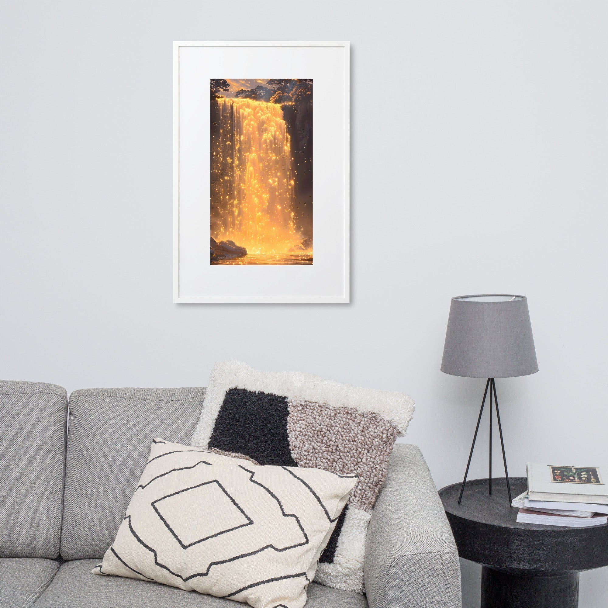 Framed poster of a golden waterfall illustration on a living room wall.